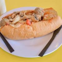 Hot Meat Ball · Served on a French roll with grilled mushrooms, onions, Italian pizza sauce, provolone and P...