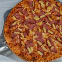 Hawaiian Pizza · Traditional pizza topped with ham and chunks of juicy pineapple.