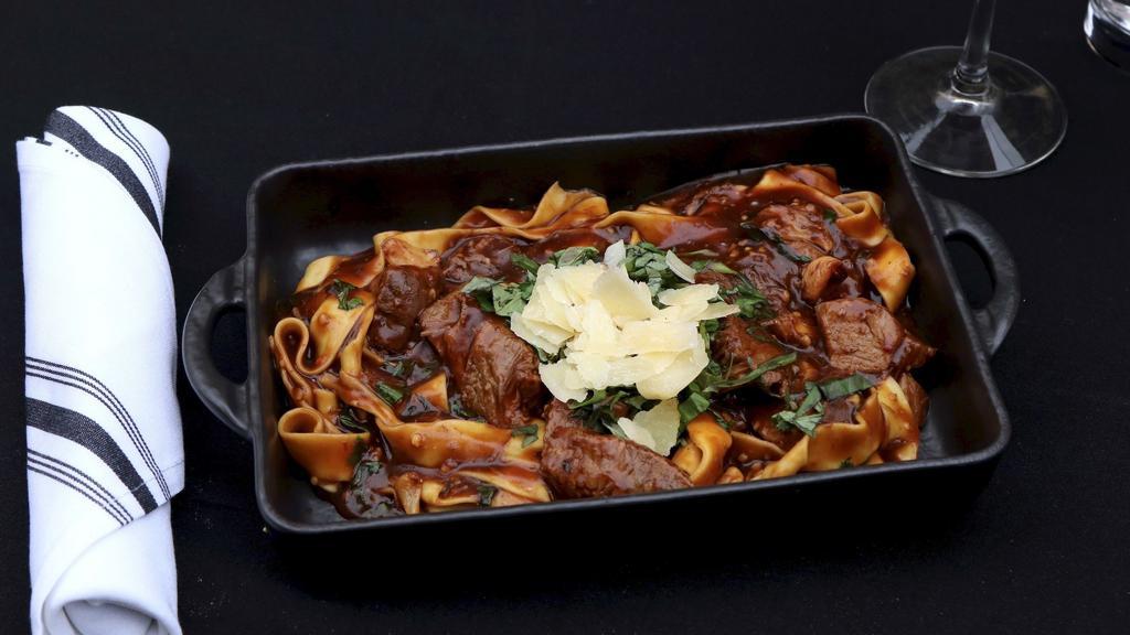 Tagliatelle · Braised short ribs in own juice, chili flakes.