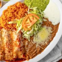 Enchilada Plate · 3 enchiladas with choice of meat, rice, beans, cheese, sour cream, guacamole,