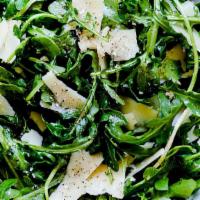 Arugula Salad · Organic baby arugula with shaved parmesan cheese, extra virgin olive oil, and lemon.