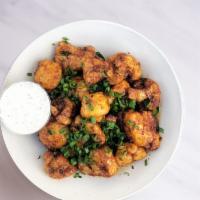 Peanut Butter Cauliflower Wings  · Gluten-free, vegan cauliflower wings tossed in our Peanut sauce and served with housemade ve...