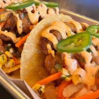 Fish Tacos (3) · Spicy. Award-winning. Choice of grilled or beer battered fish, with pickled daikon & carrot,...