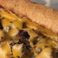 Pittsburgh Cheese Steak · Spicy. Thinly-sliced grilled marinated steak, house-pickled sweet peppers, grilled gourmet m...