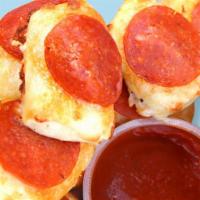 Pizza Bitz · A slice of pepperoni and a sprinkle of three-cheese blend top each of our Pizza Bitz. Add PI...