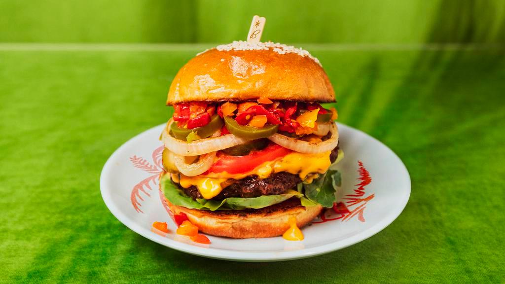 Spicy Pepper Burger · Juicy cheeseburger with jalapenos, tomato, lettuce, onions and sriracha sauce.