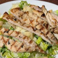 Chicken Caesar Salad · Grilled chicken breast, chopped Romaine tossed with Parmesan, garlic croutons & creamy Parme...