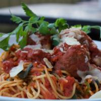 Spaghetti & Meatballs · A blend of lamb & beef meatballs simmered in roasted garlic and spinach marinara with Parmes...