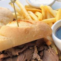 8Oz Prime Rib French Dip · Thinly sliced roast prime rib warmed in rich beef jus, piled high in a crispy French roll wi...