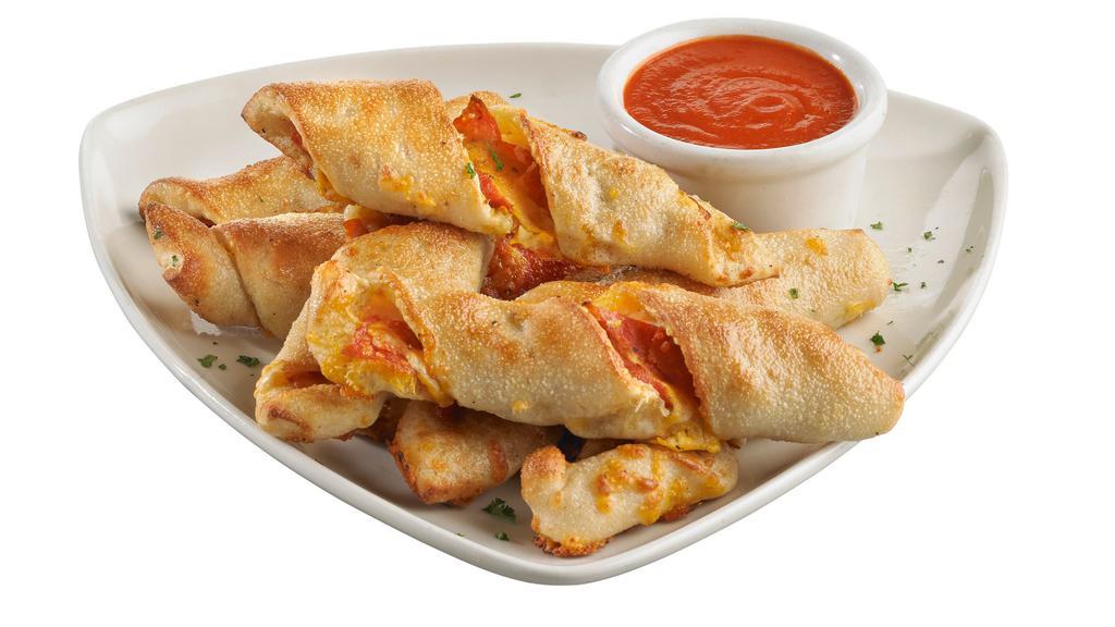 Pepperoni Stuffed Twist Bread · Our hand-pressed pizza dough stuffed with sliced pepperoni, cheddar, mozzarella, and parmesan cheeses, twisted, then baked to perfection. Served with our signature pomodoro sauce for dipping. (1,860 Cal)
