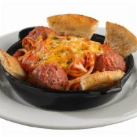 Baked Spaghetti & Meatballs · Spaghetti and meatballs smothered in pomodoro sauce, tomatoes, garlic, and basil, then baked...