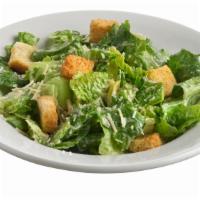Caesar · Thinly sliced, crisp romaine lettuce, shredded parmesan cheese, and croutons all tossed in o...