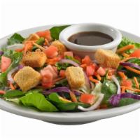 Starter House Salad · Spring mix with red onions, cucumbers, diced tomatoes, shredded carrots, and savory croutons...