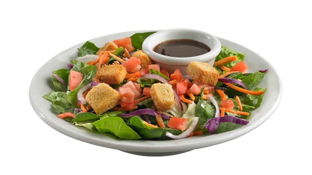 Starter House Salad · Spring mix with red onions, cucumbers, diced tomatoes, shredded carrots, and savory croutons. Served with your choice of dressing.