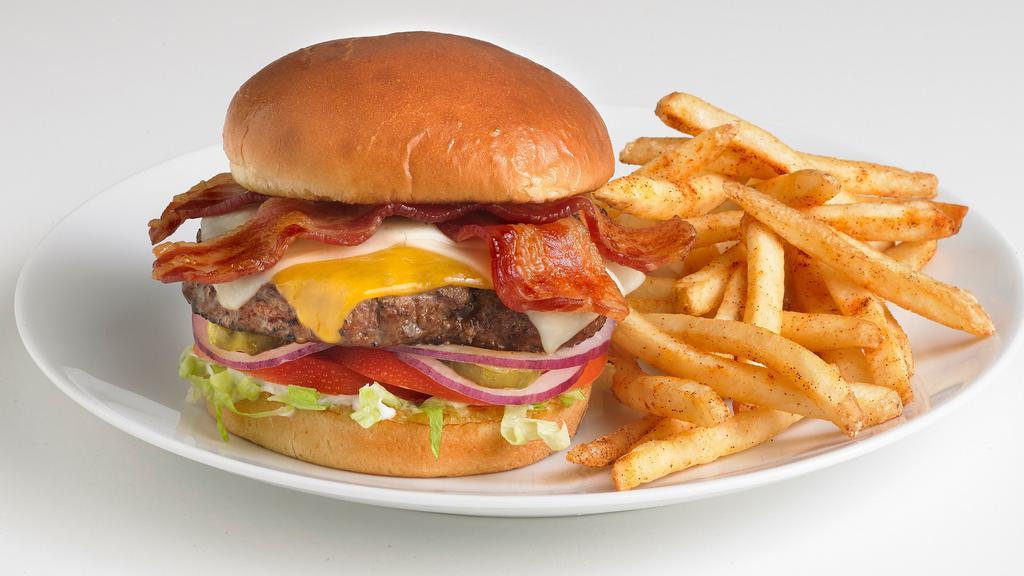 Sliders  Mvb (Most Valuable Burger) · A miniature burger topped with mozzarella cheese and bacon, served on a bed of lettuce with mayo, tomatoes, red onions, and pickles. 
*The MVB (Most Valuable Burger) sliders are cooked to well-done. (1,540 Cal)