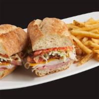 Club Sandwich · Stacked turkey, ham, cheddar cheese, bacon, lettuce, freshly-sliced tomatoes, and mayo on a ...