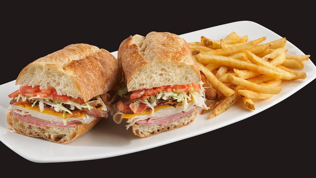 Club Sandwich · Stacked turkey, ham, cheddar cheese, bacon, lettuce, freshly-sliced tomatoes, and mayo on a toasted hoagie roll.