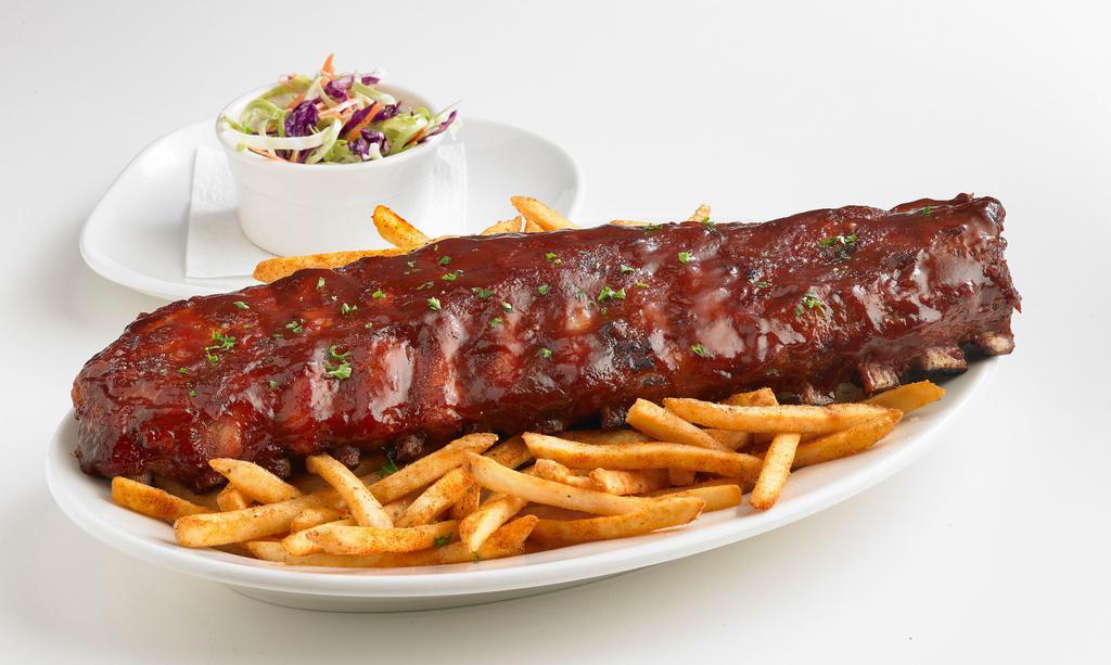 Ribs · A sensational slab of tender, all American pork ribs smothered with barbecue sauce and slow roasted to perfection. Served with your choice of two sides.