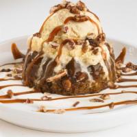 Boston'S Whiskey Cake · This scrumptious sticky toffee pudding cake is surrounded by a decadent whiskey butter sauce...