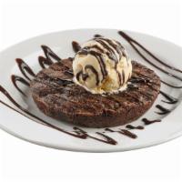 Chocolate Brownie Addiction · Two deluxe brownies served with vanilla ice cream and generously drizzled with chocolate and...