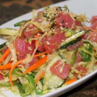 Hawaiian Poki Salad · Medium. Tuna with seaweed salad, carrot, lettuce, cucumber, and tobiko with spicy  poki sauce.