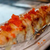 Lion King · (Crab meat and avocado) salmon, unagi sauce, and tobiko. baked roll.