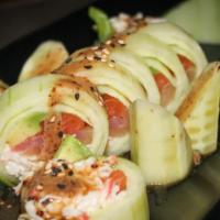 Green Beauty · (Tuna, salmon, albacore, and crabmeat) wrapped in cucumber, mustard, soy sauce, and house dr...