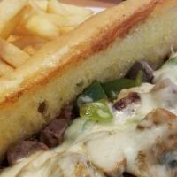 Philly Cheesesteak · Slices of top sirloin grilled with mushrooms, onions, bell peppers and Jack cheese, served o...