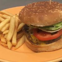 Original Burger · With lettuce, tomatoes and pickles. Add onions to your burger upon request (no additional co...