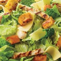 Chicken Caesar Family · Fresh-cut lettuce blend, grilled chicken, shaved parmesan cheese and croutons made daily; se...