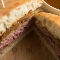 French Dip · roast beef, grilled onion, swiss and a side of au jus on ciabatta bread
