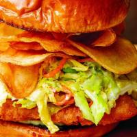 Fish & Chips · 2 filets of beer battered cod, tartar sauce and cashew coleslaw topped with potato chips on ...