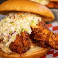 Sandwich Only · Large nashville-style boneless chicken breast fried to perfection topped with coleslaw, pick...