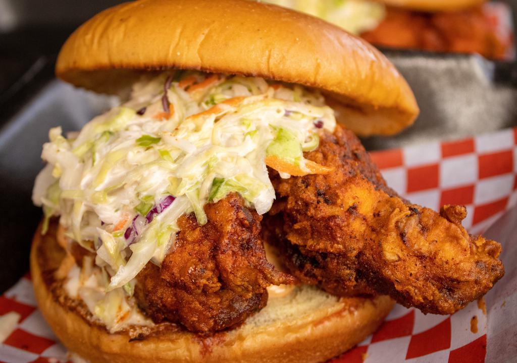 Sandwich Only · Large nashville-style boneless chicken breast fried to perfection topped with coleslaw, pickles and our secret sauce.