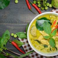 Thai Green Curry · A traditionally prepared green curry with bamboo shoots and coconut milk.