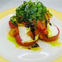 Caprese · Roma tomatoes, basil, fresh mozzarella, peppers, balsamic reduction, pesto, olive oil.