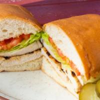 Chicken Breast Sandwich · Served on a toasted french roll with Lettuce and Tomato