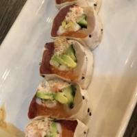 Lollipop Roll · Tuna, salmon, yellowtail, shrimp, crab, avocado, cucumber wrapped in soy paper topped with P...