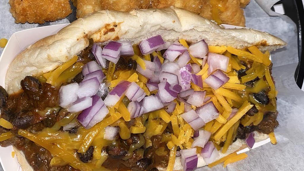 Chili Dog · ¼ lb dog topped with house-made black bean chili, cheddar cheese & onion.