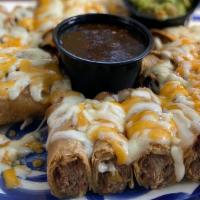Muchisimos Taquitos · A pico favorite! Appetizer size beef or chicken taquitos with melted cheese and salsa.