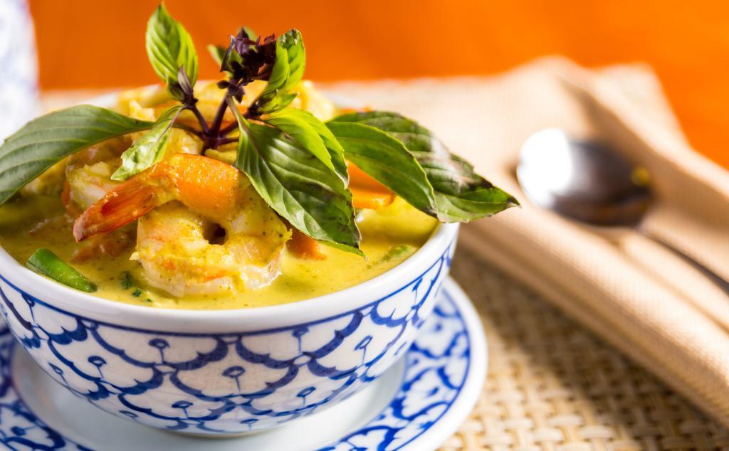 #33. Kaeng Kiew (Green Curry) · Medium spicy. Zucchini, corns, green beans, carrots, bamboo shoot, bell pepper, eggplant and Thai basil, simmered in coconut milk-spicy green curry.