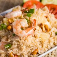 #59. Kao Pad Sup-Pa-Rod (Pineapple Fried Rice) · Thai fried rice with chicken, shrimp, pineapple, onion and cashew nut.
