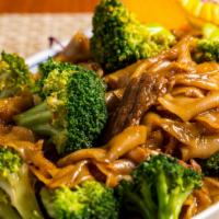 #61. Pad See-Ew (Black Bean Sauce Noodle) · Stir-fried flat rice noodle with garlic, egg and broccoli in sweet black bean sauce.