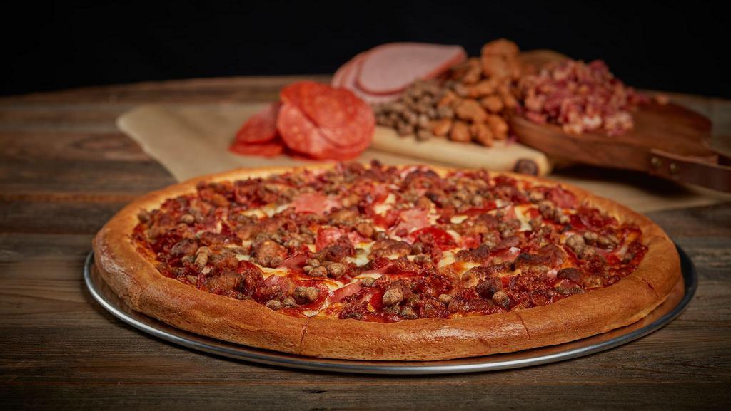 Meat Lovers Pizza · Pepperoni, Canadian Bacon, Sausage, Beef and diced Bacon slices all on our classic 14” pizza that starts with our Non-GMO Pizza Sauce made from Fresh Vine-Ripened tomatoes. And our two-cheese Mozzarella Cheese Blend.