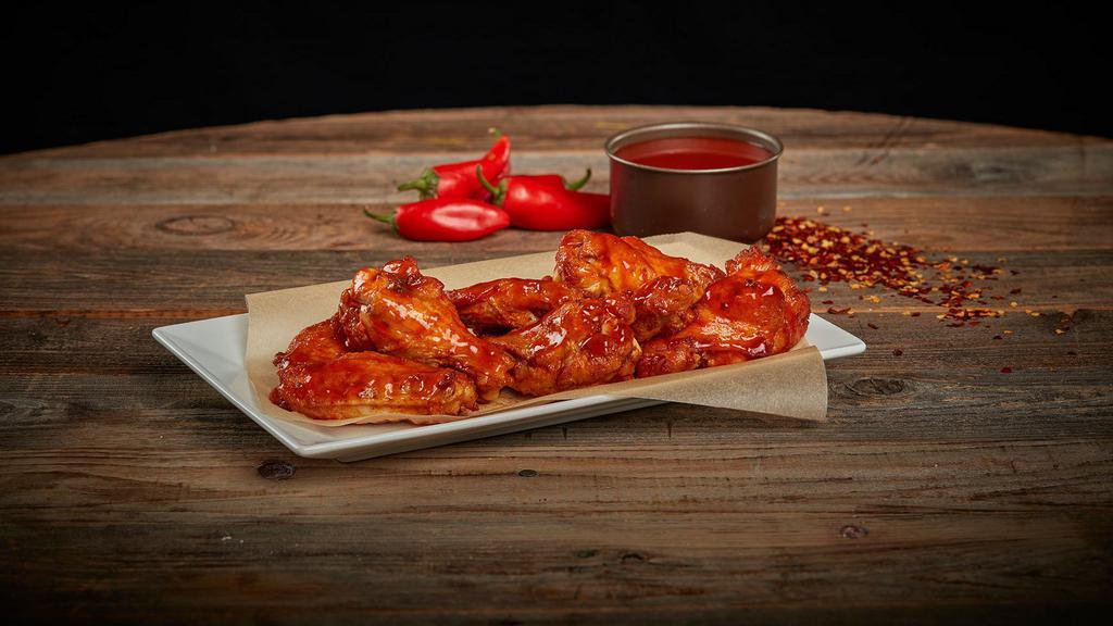 Chicken Wings · You’ll Love our Premium, Bone-in, All-Natural Chicken Hot Wings” (4 Wings, 4 Drums) that are glazed in hot-sauce. They will impress all who try.  Also Includes a large 1.5 oz packet of delicious Ranch.