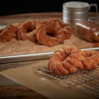 Churro Donuts  · Our Churro donuts are warmed in our oven and seasoned with a classic Cinnamon-Sugar topping ...