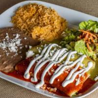 Green Enchiladas · Vegan, gluten-free. Two enchiladas served with re-fried beans and rice. Choose chicken, pork...