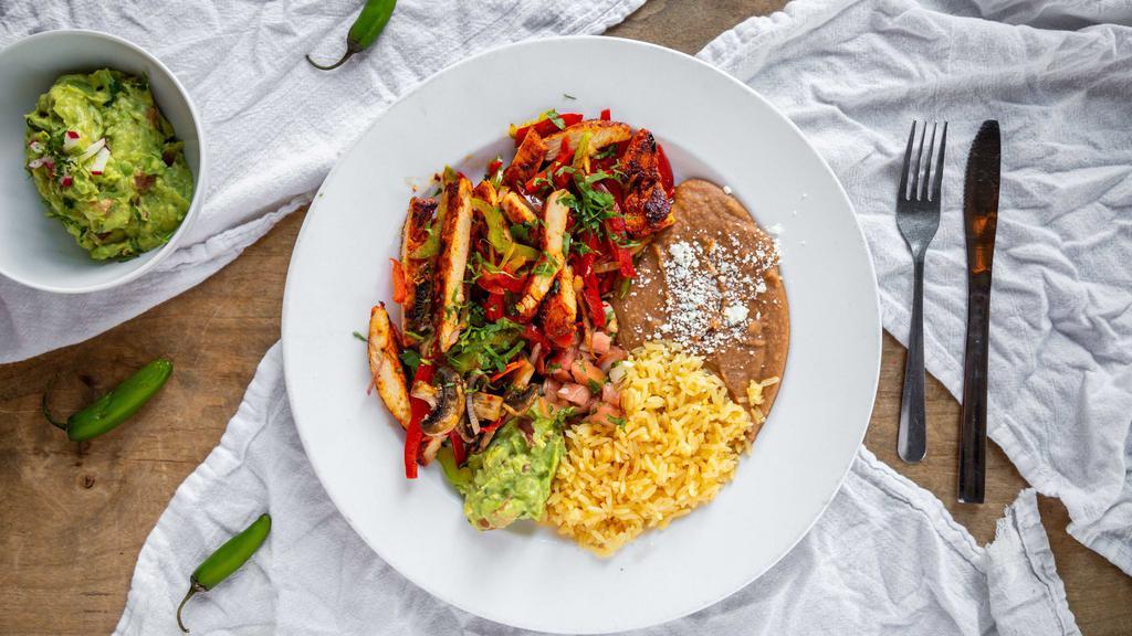 Fajitas · Your choice of grilled steak or chicken served with grilled bell pepper, onion, mushroom, pico de gallo, sour cream, beans, and rice. Add shrimp for an additional charge.