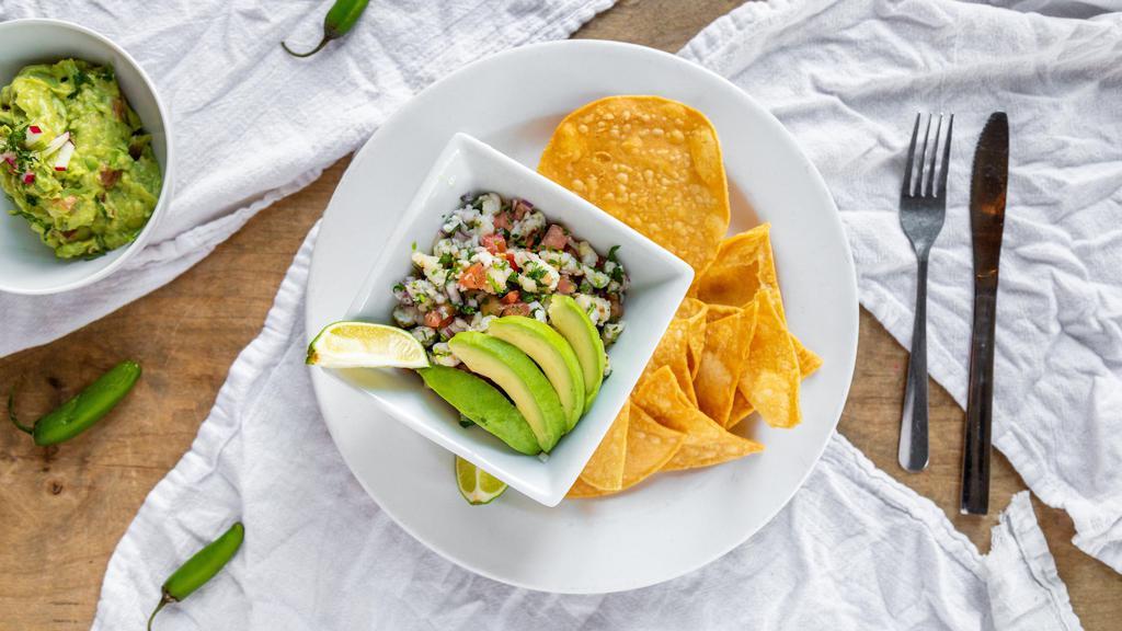 Ceviche · Red snapper and shrimp marinated in lime juice, red onion, jalapeño, and cilantro. Served with slices of avocado. Consuming raw or undercooked meats, poultry, seafood, shellfish, or eggs may increase your risk of foodborne illness