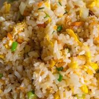 Thai Classic Fried Rice · Egg, garlic, onion, tomato and chinese broccoli.